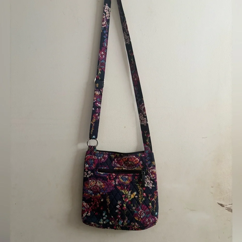 Vera Bradley Hipster Crossbody purse in the Midnight Wildflowers pattern.